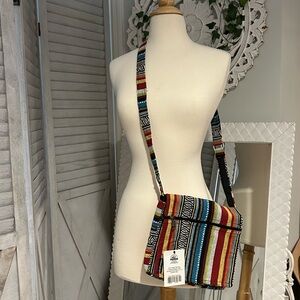 NWT US Sherpa Gheri striped bag. 3 pockets/zippers, Velcro close, adj strap.